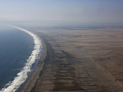 A view of Arica, Chile, at the beginning of a <a href="/people/postcards/vocals/vocals_post.html&edu=high">research campaign to study climate science in the southeastern Pacific</a>. Arica is near the <a href="/earth/atacama_desert.html&edu=high">Atacama Desert</a>, one of the most <a href="/earth/extreme_environments_hot_cold_dry.html&edu=high">arid</a> and barren places on Earth.<p><small><em>Image courtesy of Carlye Calvin, UCAR</em></small></p>